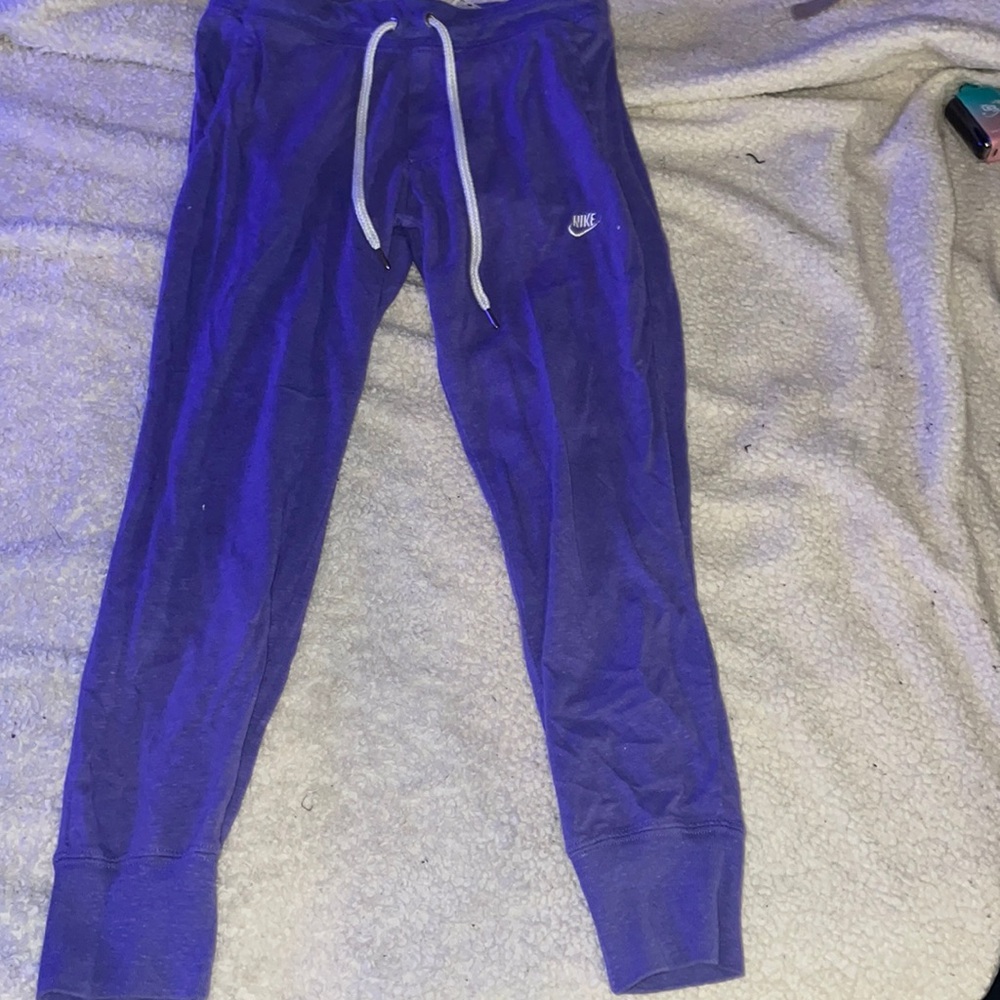 Purple Nike joggers, size small more like an extra small.